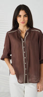 brown blouse with white embroidery 