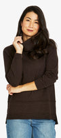 brown cowl neck sweater and blue jeans 