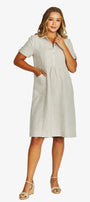 Front View light beige short sleeve linen shirt dress with a button down collar and side pockets, paired with beige wedge sandals.