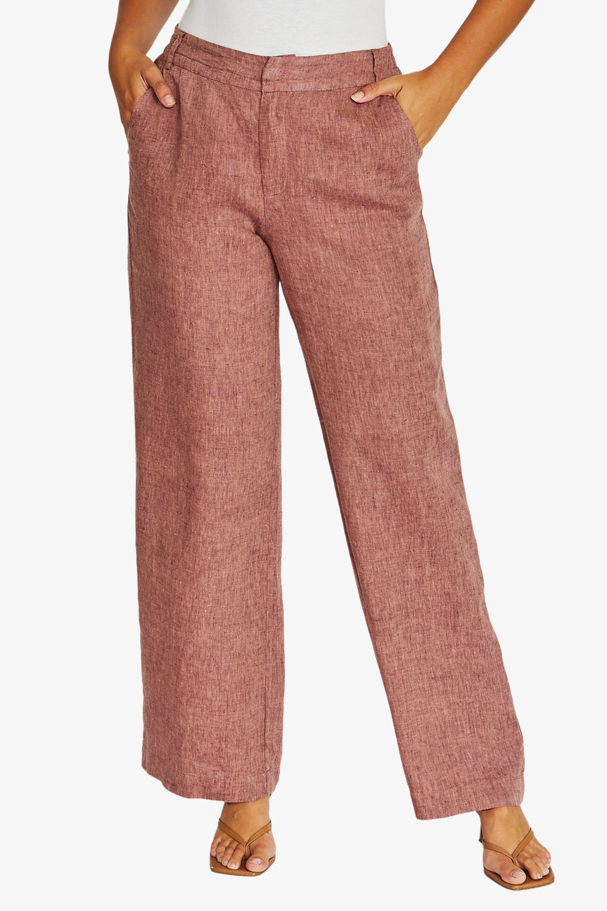 Front View dusty rose wide,leg cropped pants with a textured linen like fabric, paired with a white top and tan sandals.