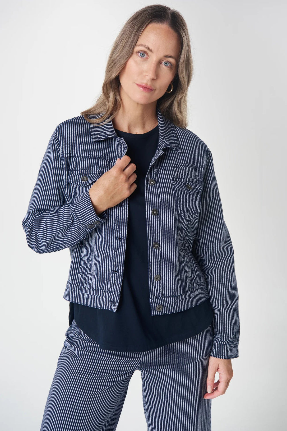Front View  blue striped jacket and pants .
