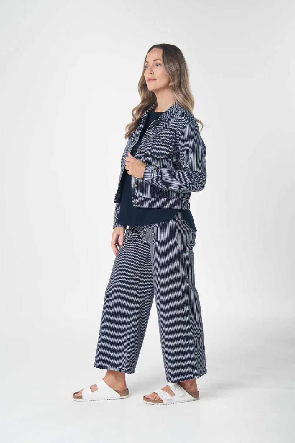 Side View  a navy white checkered outfit 