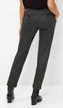 Bsck view black and white checkered pants.