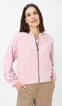 Woman wearing a pink jacket front view