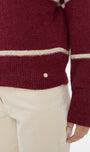 Close up Maroon sweater with white stripes 