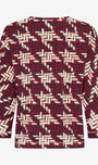 Long sleeve top with a red and beige geometric pattern.