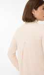 Side view a beige sweater 