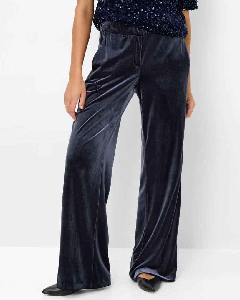 Navy velvet pants front view.