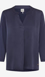 Navy blue blouse with a collar .
