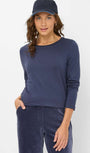 Front View  a navy long sleeve top and pants with a matching cap .