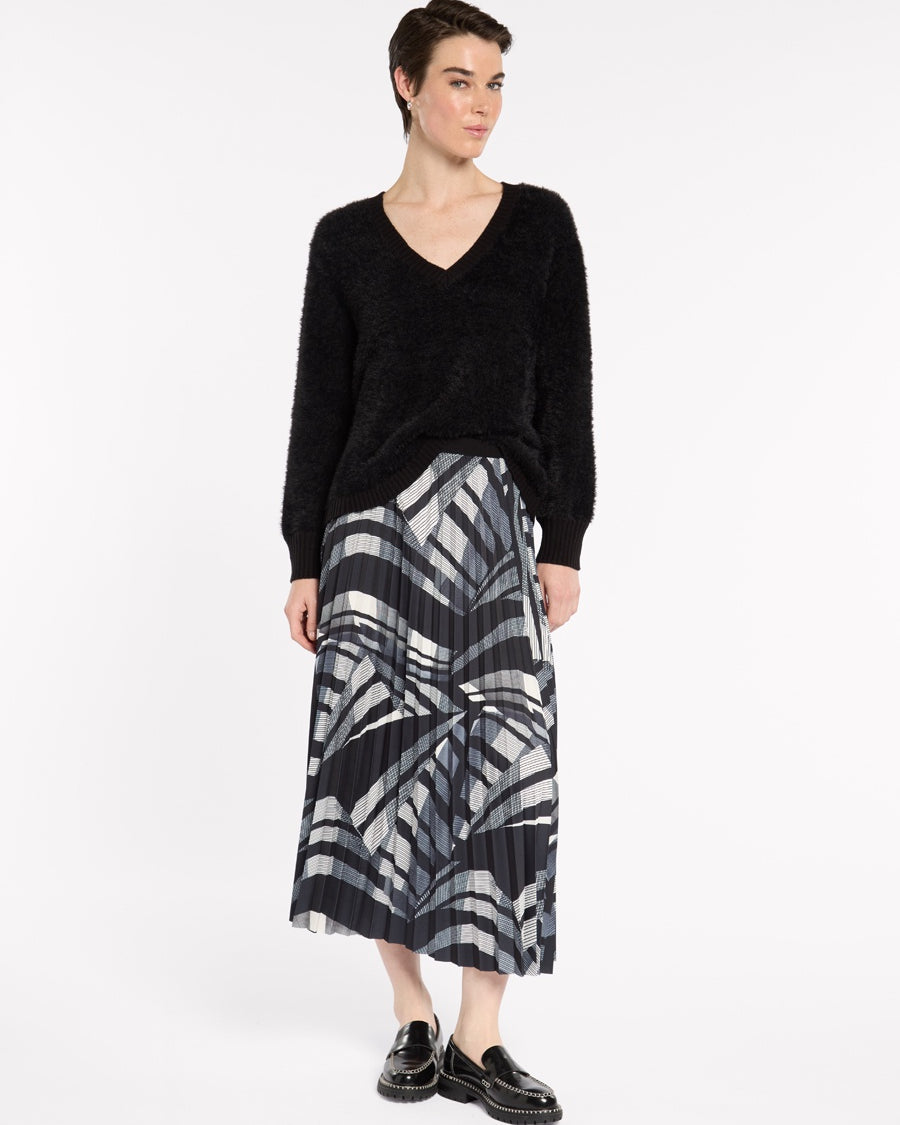 "Marco Polo Casablanca Pleated Skirt — exclusive Black and Ivory print with all-over pleats"