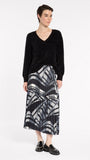 "Marco Polo Casablanca Pleated Skirt — exclusive Black and Ivory print with all-over pleats"
