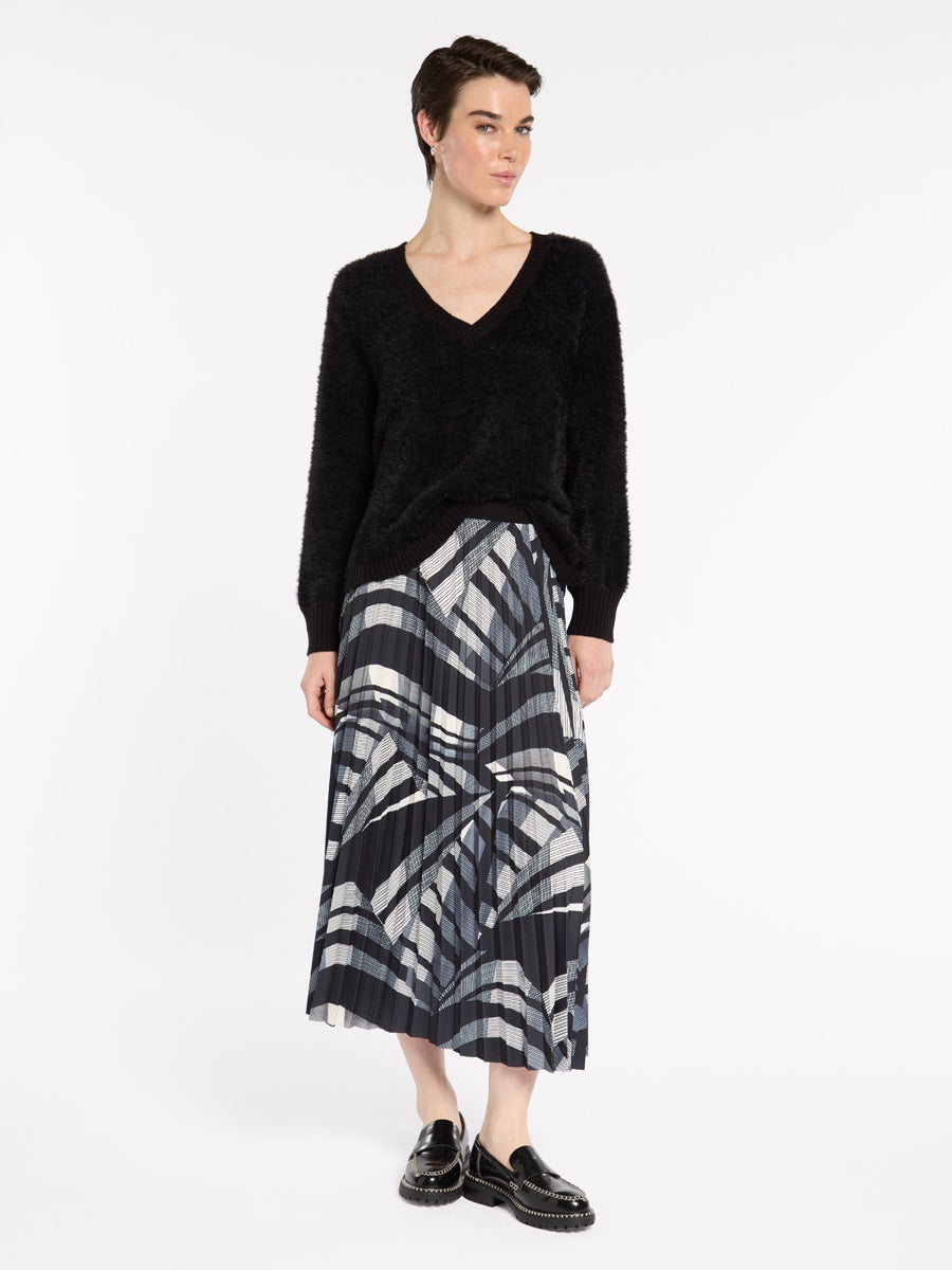 "Marco Polo Casablanca Pleated Skirt — exclusive Black and Ivory print with all-over pleats"