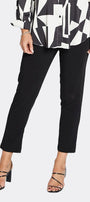 black and white geometric patterned blouse with black pants 