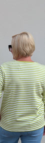 Back view  a green and white striped  top.