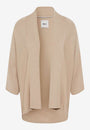 Beige ribbed cardigan Front view.
