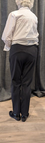 Back view of a white shirt and black pants 