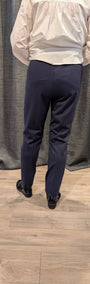 Back view white shirt and navy pants 