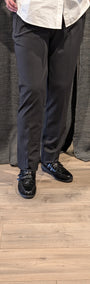 Front view black  pants and black shoes 
