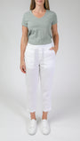 White linen pants and a saget T- shirt.