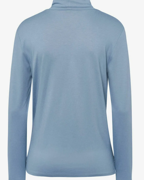 Back view a blue long sleeved turtleneck shirt.